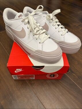 Nike White Sneakers with platinum violet Accents